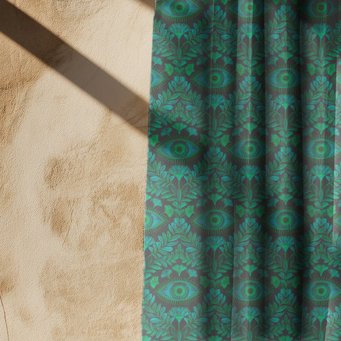 Luminous whispers of emerald sway gently, catching the light like precious jewels suspended in time. Our Guardian Eye Sheer Curtain Panel transforms ordinary windows into portals of protection and refined elegance. Vivid jewel-toned eyes nestled among flourishing botanical motifs create a mesmerizing pattern against the dark background, offering both visual intrigue and symbolic resonance within your sanctuary.
Designed for spaces that demand both statement and subtlety, this panel excels in studies, living